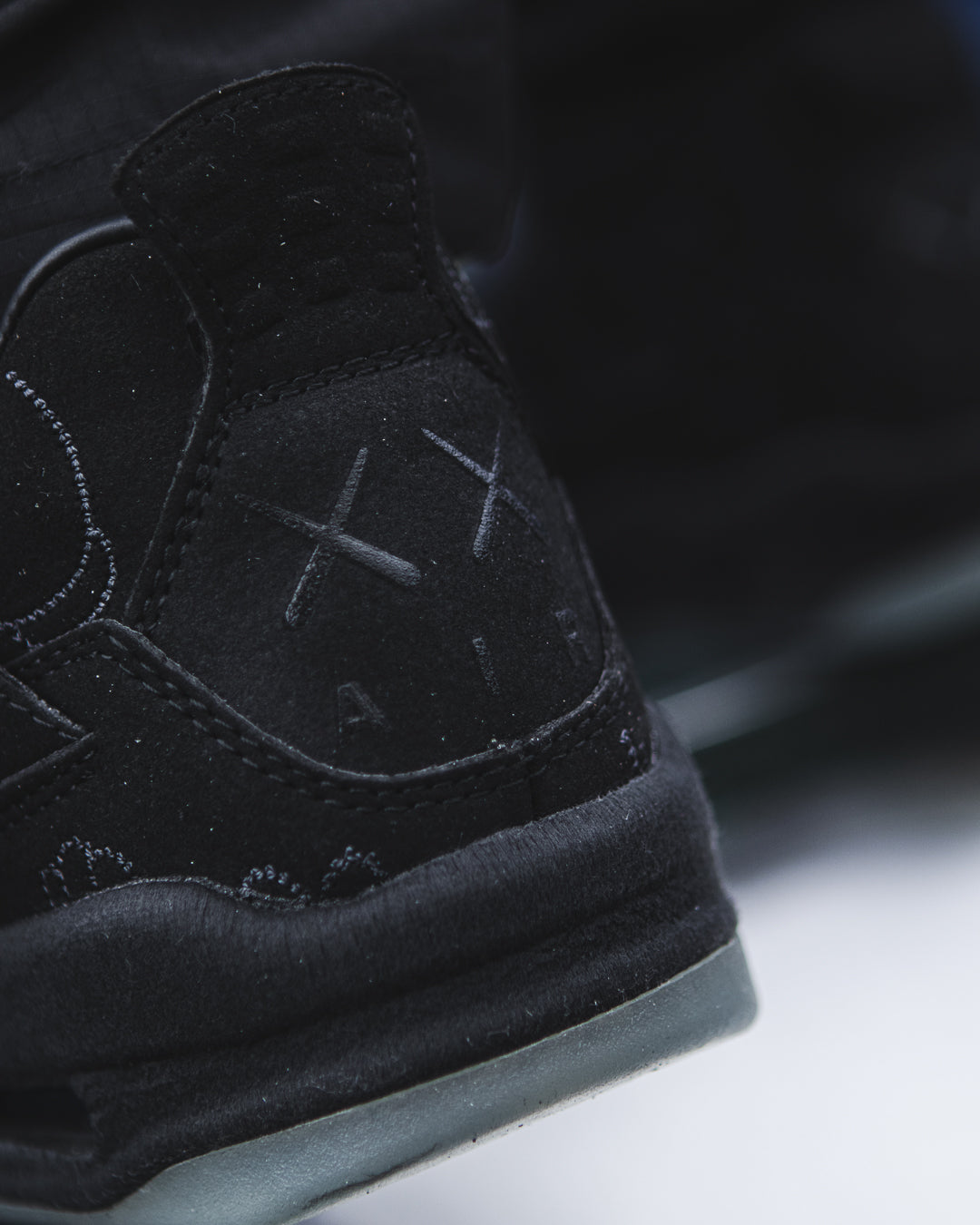 Jordan 4 Retro KAWS Black