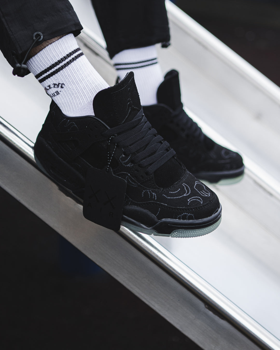 Jordan 4 Retro KAWS Black