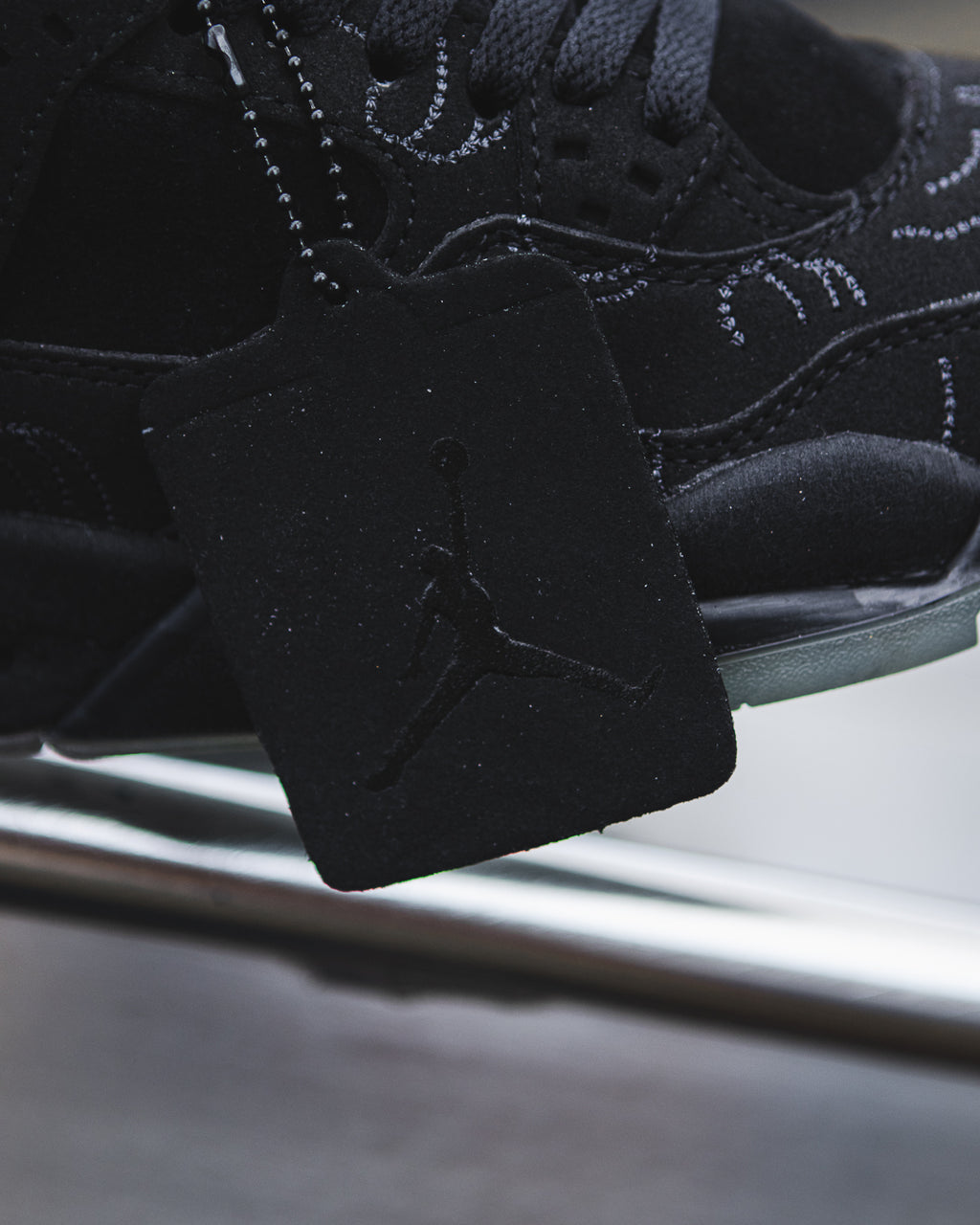 Jordan 4 Retro KAWS Black