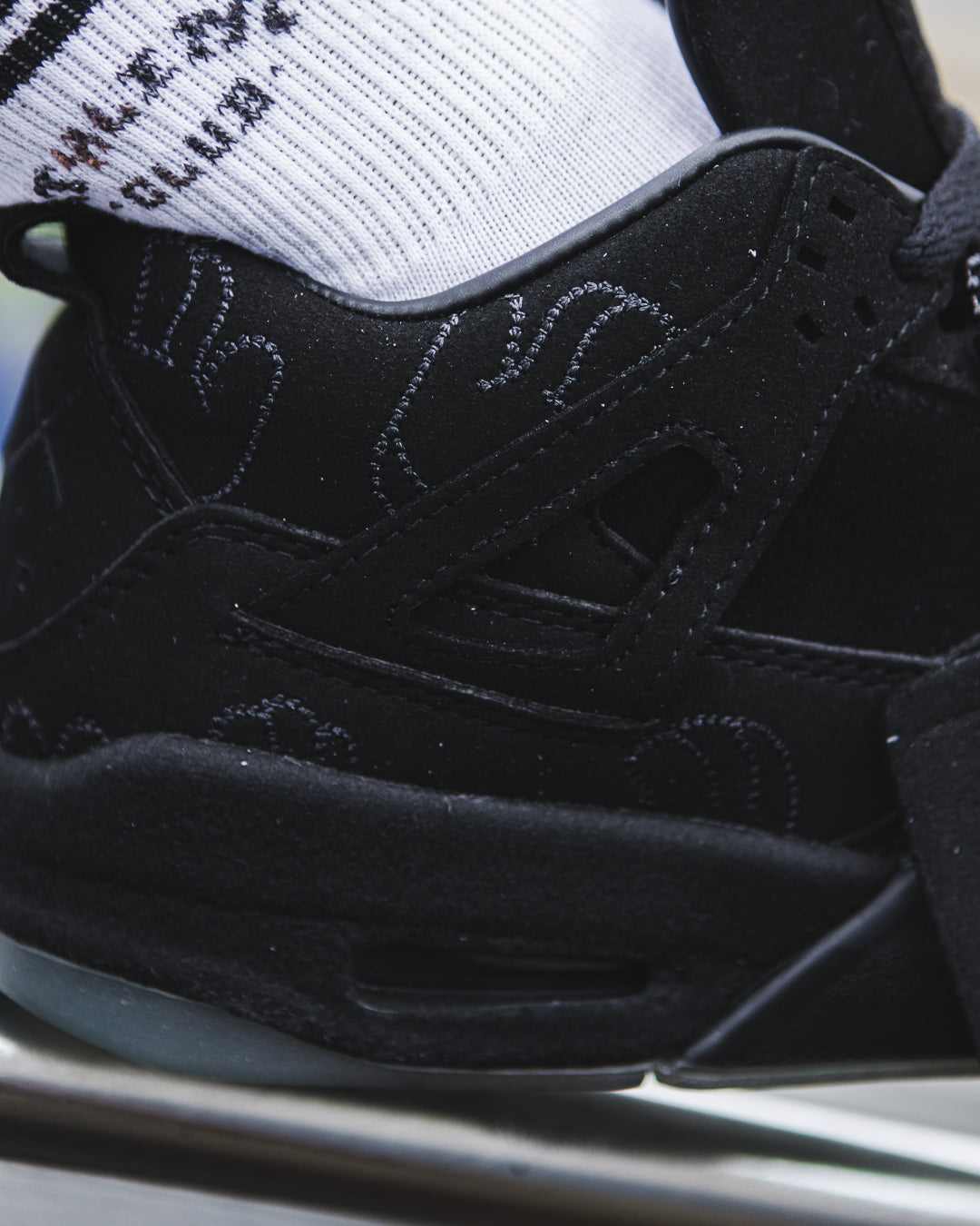 Jordan 4 Retro KAWS Black