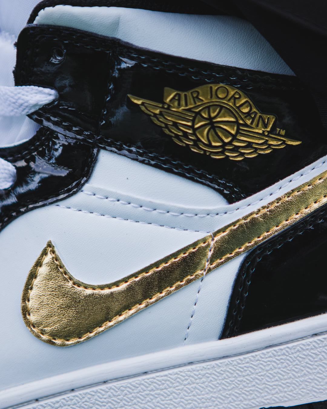 Air Jordan 1 Mid Patent Black White Gold